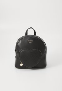 Sac à dos en cuir noir à la forme arrondie, présentant un design de cœur matelassé, des accessoires dorés et une poignée supérieure pour le transport.