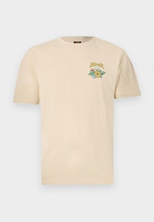 Tricou din bumbac bej, cu mâneci scurte, decolteu rotund și un grafic floral în verde, galben și alb în zona stângă a pieptului.