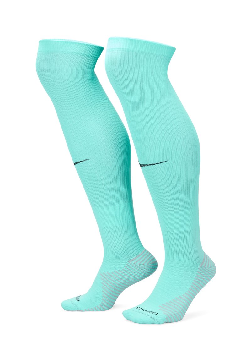 Calze compressive turchesi con design a coste, dotate di un logo nero e di un motivo a strisce sulle suole per una migliore aderenza.