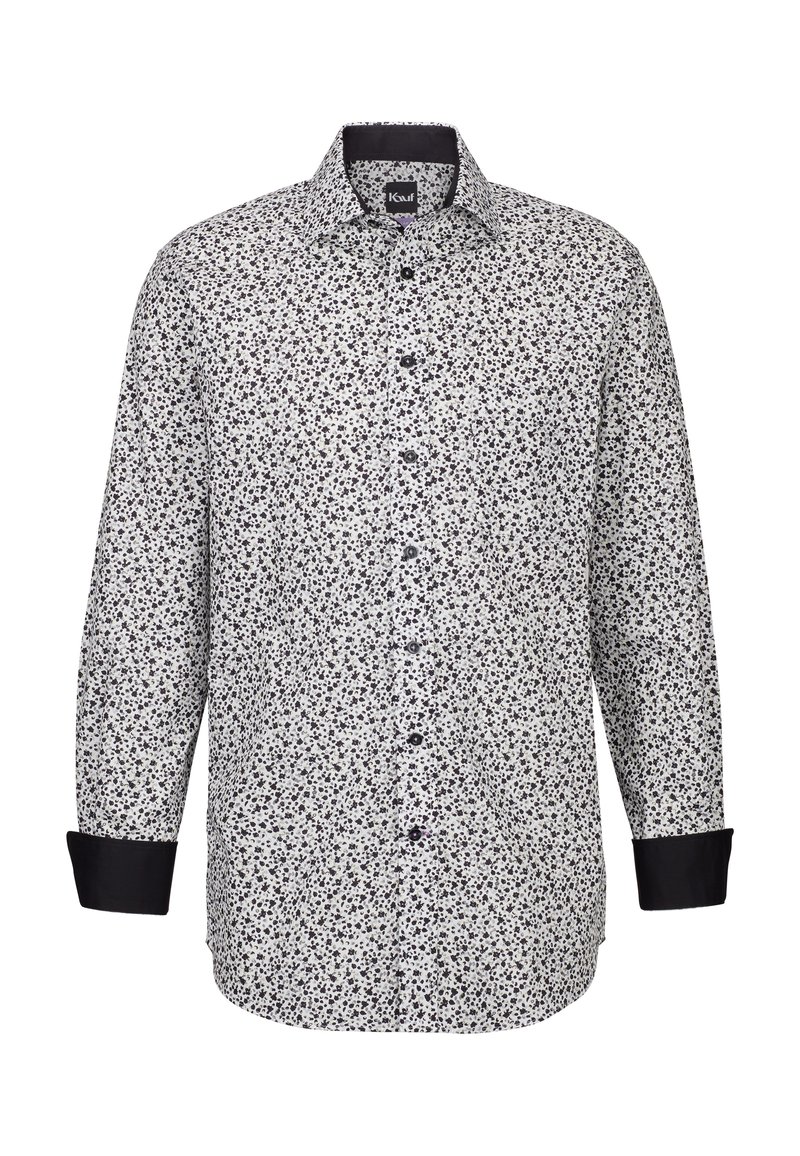 Camicetta bianca con un motivo floreale nero, colletto a camicia con bottoni e polsini neri. Presenta una vestibilità regolare e una texture del tessuto liscia.