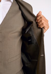 Lindbergh TECHNICAL STRETCH - Colbert - dk sand mel