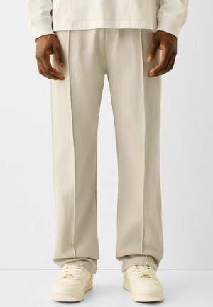 Pantalones deportivos - beige