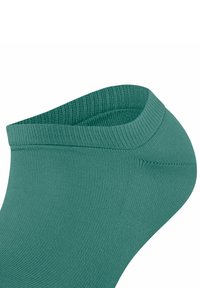 Tegenblauwe enkel sok gemaakt van elastisch materiaal met een geribde manchet. Glad textuur, strakke pasvorm en naadloos ontwerp. Geschikt voor dagelijks gebruik.