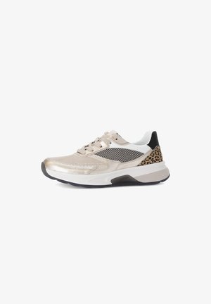 Beige sneaker with metallic accents, mesh panels, and leopard print detail on the heel. Features gray sole and white laces.