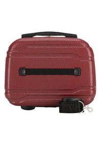 Valigia da viaggio rigida rossa con un'esterno texturizzato, cinturino accentato nero, maniglia superiore e piedi in gomma nera per stabilità. Include un cinturino rimovibile.
