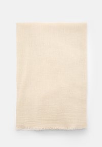 Beige, teksturoitu kangas, jossa on pehmeä pinta ja hapsutetut reunat. Suorakulmainen muoto, sopii huiviksi tai kääreeksi.
