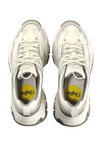 White and gray sneakers with a mesh upper, patterned accents, thick rubber soles, and a round logo on a yellow insole.