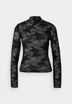 Top negro de encaje de manga larga con cuello alto, que presenta patrones florales y textura transparente. Diseño ajustado. Puños a medida.