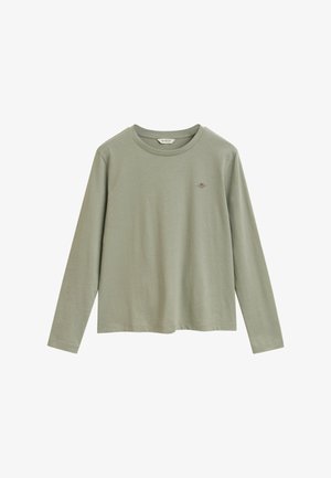 Langarmshirt aus leichtem grünen Baumwollstoff, mit rundem Halsausschnitt und kleinem gesticktem Logo auf der Brust. Schlichte und lässige Passform.