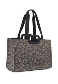 Prostokątna torba na ramię z czarnym abstrakcyjnym wzorem, dwiema długimi czarnymi ramiączkami oraz mniejszym prostokątnym uchwytem na środku górnej części.