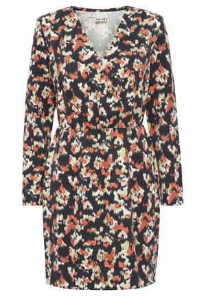 Wrapkjol i mörk marinblått tyg med ett färgglatt abstrakt mönster i röd, vit och grön. Långa ärmar och en figursydd midja.