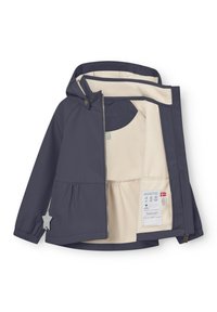 Otroška kapucar s kapuco v mornarsko modri barvi, z bež flisasto podlogo, sprednjim zadrgo, elastičnimi manšetami in odsevno zvezdasto značko na rokavu.