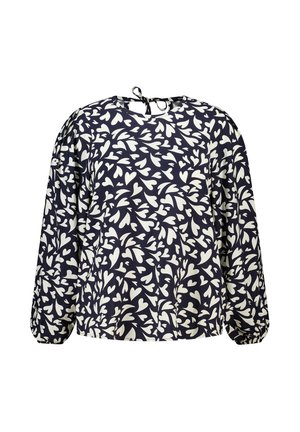 Blouse marine à manches longues avec poignets élastiques et motif abstrait blanc en forme de cœur, fermeture par lien à l'arrière du col.