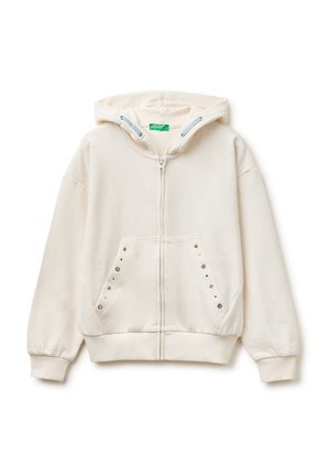 Kremowa bluza na zamek z kapturem, z przednimi kieszeniami wyposażonymi w metalowe oczka i sznurek w kapturze.