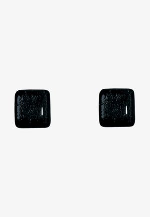 Deux boutons carrés noirs brillants avec des bords arrondis, espacés sur un fond blanc.