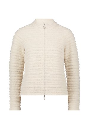 Witte textuurjacket met een hoge kraag, voorzien van horizontale ribbelpatronen en een ritssluiting aan de voorkant. Gemaakt van zachte, pluizige stof.