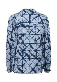 Dlouhý rukáv blůza z světle modré látky s námořnickým tie-dye vzorem a zlatými květinovými akcenty. Obsahuje zadní kapsu a nařasené manžety.