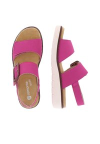 Rosa Sandalen aus Kunstleder mit einer leichten Sohle. Sie verfügen über zwei verstellbare Riemen und ein gepolstertes Fußbett für zusätzlichen Komfort.