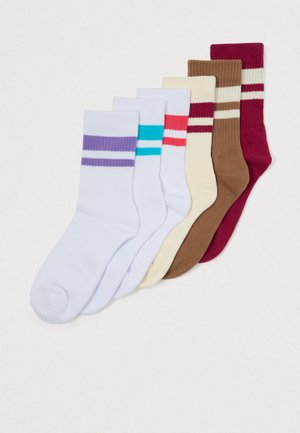 Set of six cotton socks in various solid colors: white, cream, brown, maroon, turquoise, and red, with contrasting stripes near the top.