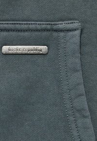 Užtrauktuku užsegamas treningas - washed grey