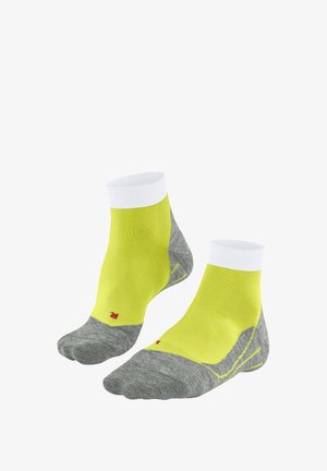 Ankle socks with a bright yellow upper and gray, textured lower sections. Features a white cuff and a red logo on the side.