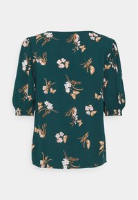 Dunkelgrüne Bluse mit ellenbogenlangen Puffärmeln, die ein hellrosa Blumen- und braunes Schmetterlingsmuster aufweist.