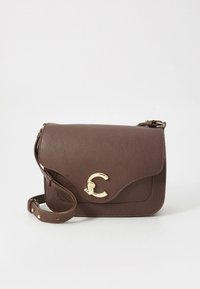 Brown pebbled leather crossbody bag with a gold-tone clasp and smooth shoulder strap. Features a flap closure and curved design.