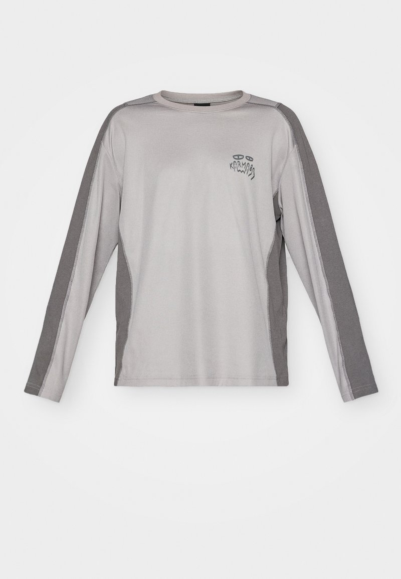 Long-sleeve gray shirt with darker gray side panels and a small black logo on the chest. Made of soft, stretchable fabric.
