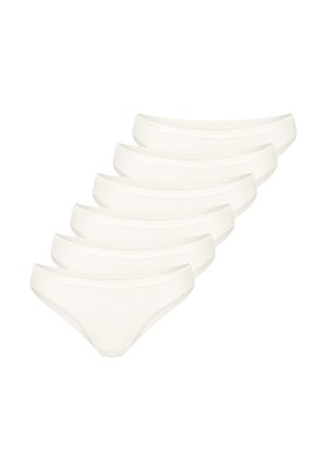 Cinque slip da donna stile bikini di colore bianco semplice impilati in modo sfalsato su uno sfondo bianco.