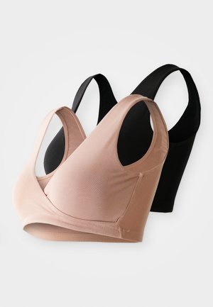 Deux bras sans coutures, l'un en beige clair et l'autre en noir. Fabriqués en tissu doux et extensible avec de larges bretelles et sans armatures.