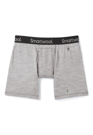 Grijs boxershorts van een zacht materiaal, met een zwarte tailleband met het "Smartwool"-logo en een kleine kleurrijke accent onderaan.