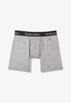 Grå boxershorts lavet af et blødt materiale, med et sort taljebånd der har "Smartwool" logo og en lille farverig detalje nederst.