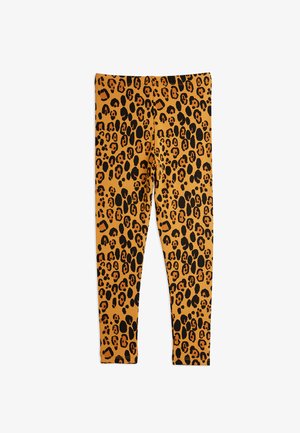 Leggings de estampado de leopardo em algodão laranja e preto, com um design elástico, textura suave e silhueta ajustada.