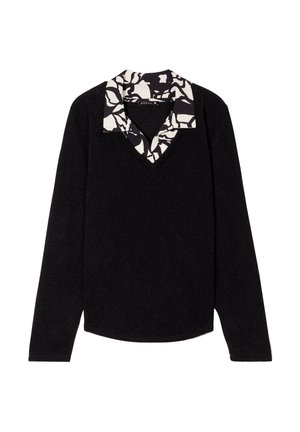 Top nero a maniche lunghe con scollo a V e colletto in contrasto, a motivo astratto bianco. Tessuto morbido, vestibilità leggermente ampia e orlo arrotondato.