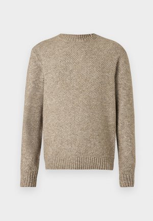 Beez värvi kudumiga sviiter tekstuuriga mustriga, ümmarguse kaelusega ning ribakardinate ja -äärega. Tagantpoolt vaadatuna on ühtlane värv.