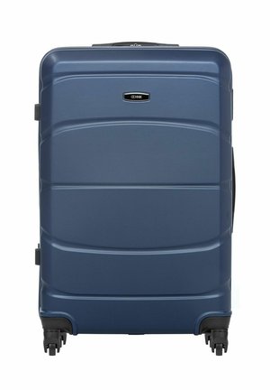 Niebieska walizka z twardą powłoką, wyposażona w cztery czarne obrotowe kółka i uchwyt górny, widziana z przodu.