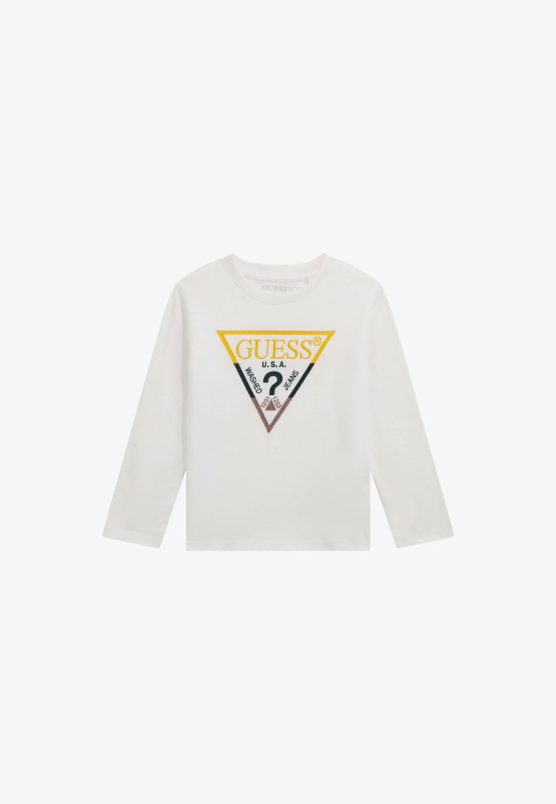 Bijela majica dugih rukava s trokutastim, višebojnim grafičkim logotipom "GUESS". Sadrži žute, zelene i smeđe naglaske. Mekani pamučni materijal.