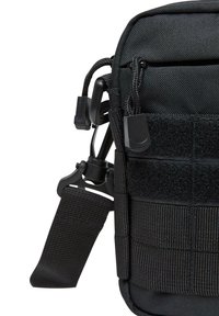 Brandit Taška cez plece - black