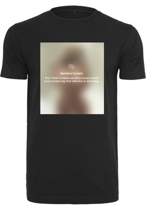 Black T-shirt with a standard crew neck, featuring a large, blurred rectangular graphic indicating sensitive content in the center.