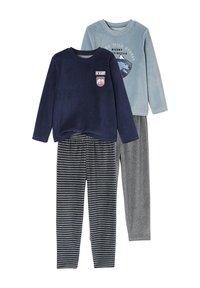 Two kids' fleece pajamas sets: one navy top with mountain patches and striped pants, one light blue top with mountain bear graphic and grey pants.