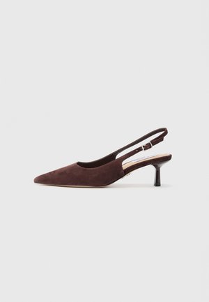 Brown suede slingback shoes with a pointed toe and a slender heel. Features an adjustable strap with a metal buckle.
