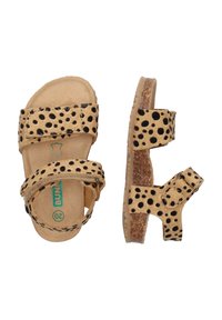 Helle Sandalen mit schwarzen Punkten, ausgestattet mit zwei verstellbaren Riemen und einer strukturierten Korksohle für besseren Halt. Aus weichem Material mit gepolstertem Fußbett.