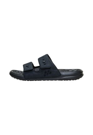 Sandalo nero a fascia con due cinturini regolabili in Velcro e suola interna testurizzata per comfort e presa.