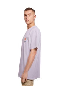 Merchcode HEARTBREAK HEAVY  - Triko s potiskem - lilac