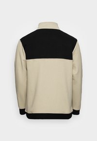 Santa Cruz Collegepaita - beige