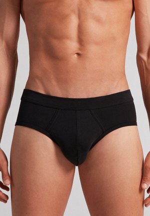 Schwarze Baumwollunterhose mit glatter Textur und elastischem Bund. Verfügt über eine konturierte Vorderseite und ein einfaches Design, ohne Muster oder Akzente.