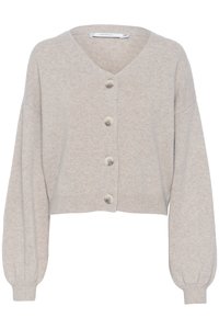 Cardigan accorciato grigio chiaro realizzato in morbido tessuto knit, con scollo a V, maniche lunghe a sbuffo e quattro grandi bottoni sul davanti.