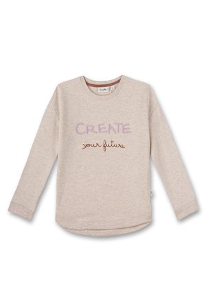 Jasno beżowy sweter z długimi rękawami, ozdobiony haftem "STWÓRZ swoją przyszłość" w kolorach fioletowym i brązowym. Miękka, strukturalna tkanina z zaokrąglonym dołem.