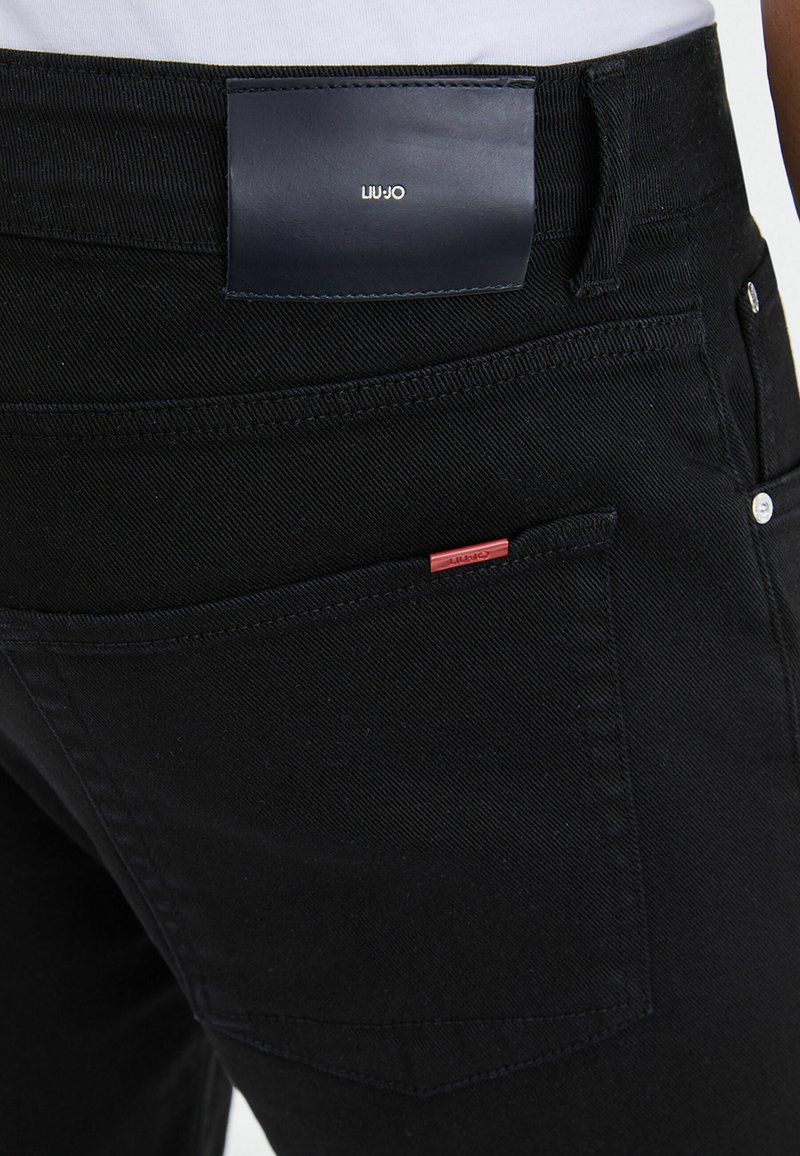Herren Skinny Fit | LIU JO Jeans Tapered Fit black/schwarz - OW39413 Herren Skinny Fit | LIU JO Jeans Tapered Fit black/schwarz - OW39413