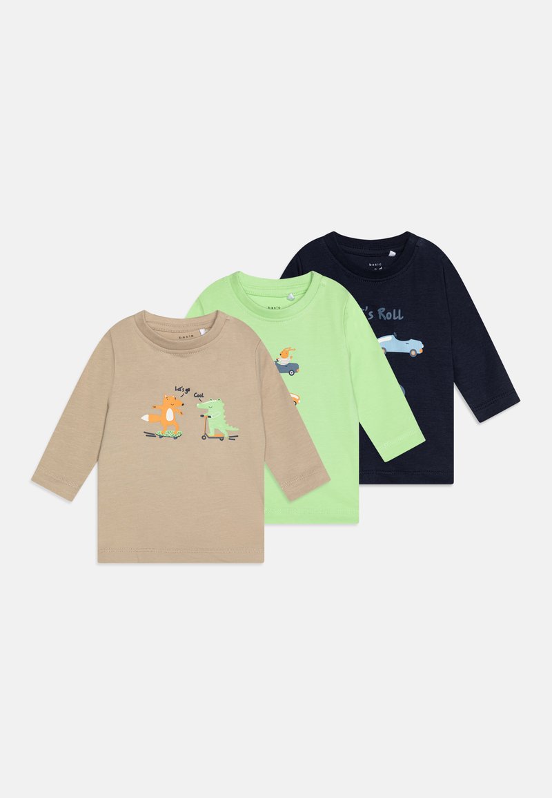 Three long-sleeve T-shirts in beige, light green, and navy. Features cartoon graphics of animals and vehicles. Cotton fabric, crew neck design.